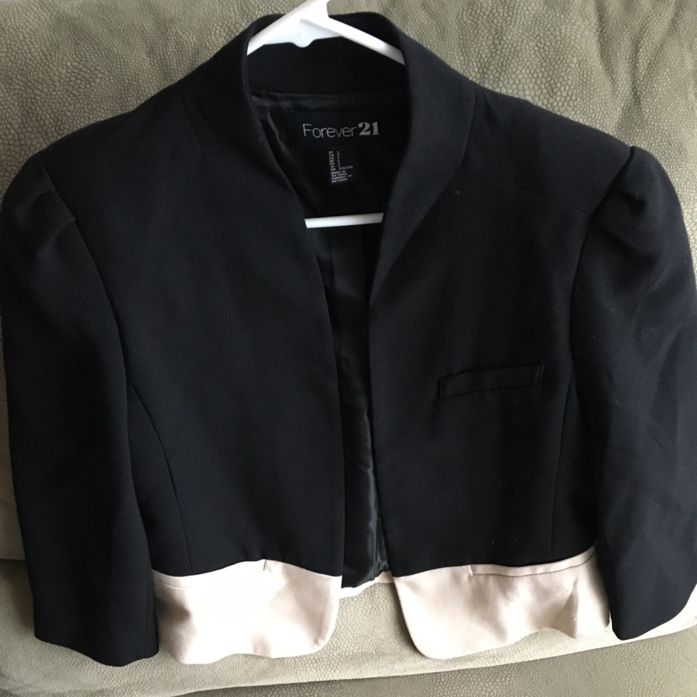 Black and White (Off-white) cropped blazer.